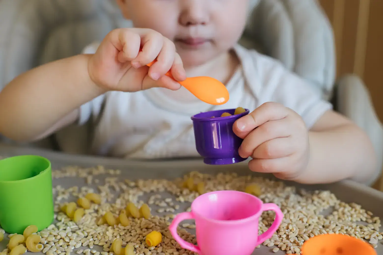 Child practicing Montessori concepts at home